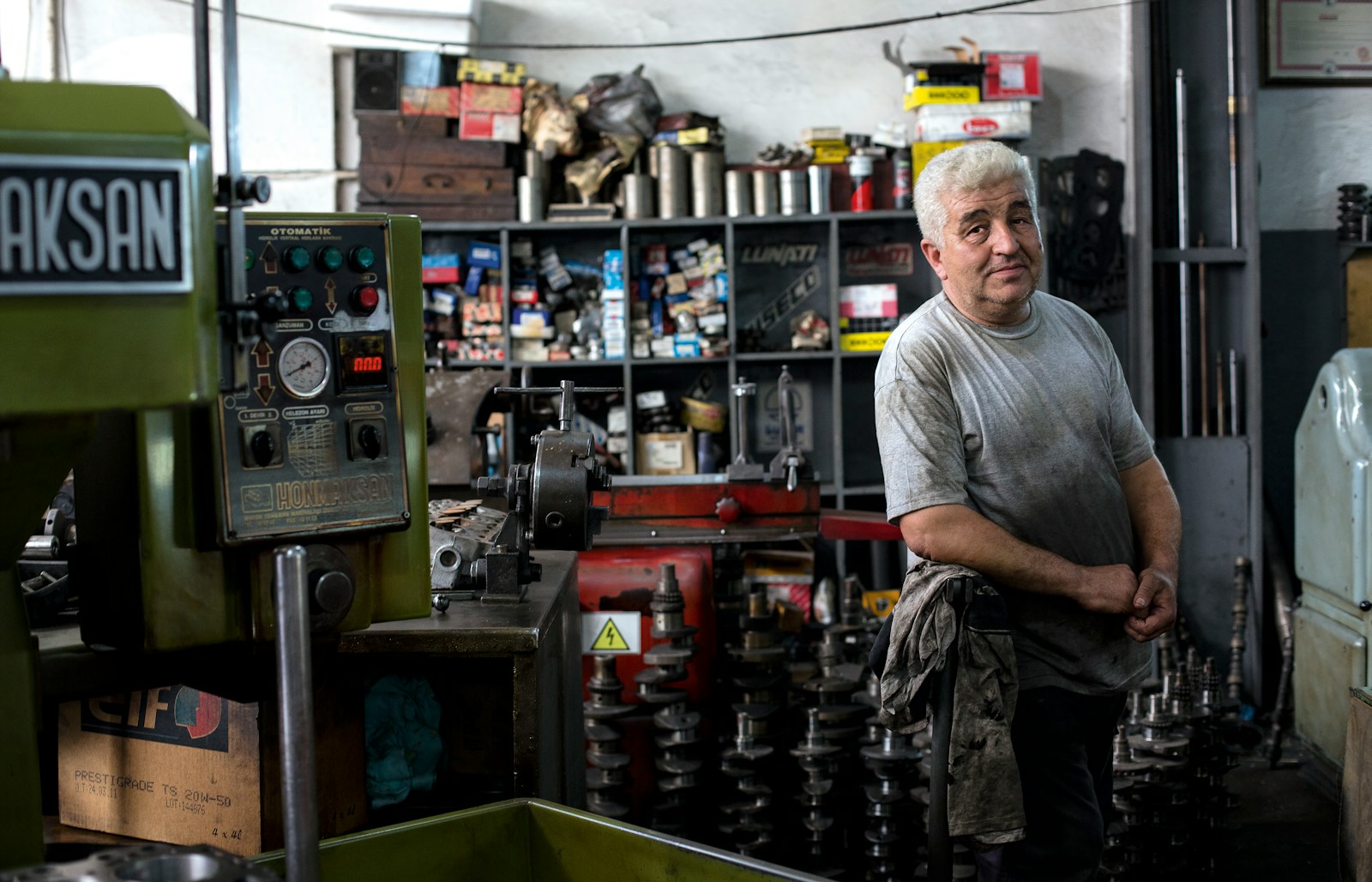 man in gray shirt in workshop